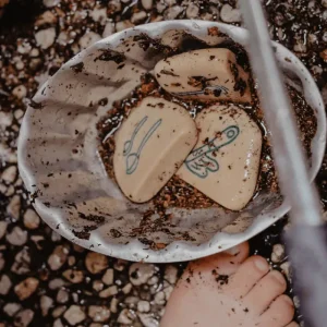 Yellow Door // Mud Kitchen Process Stones> Sensory Play